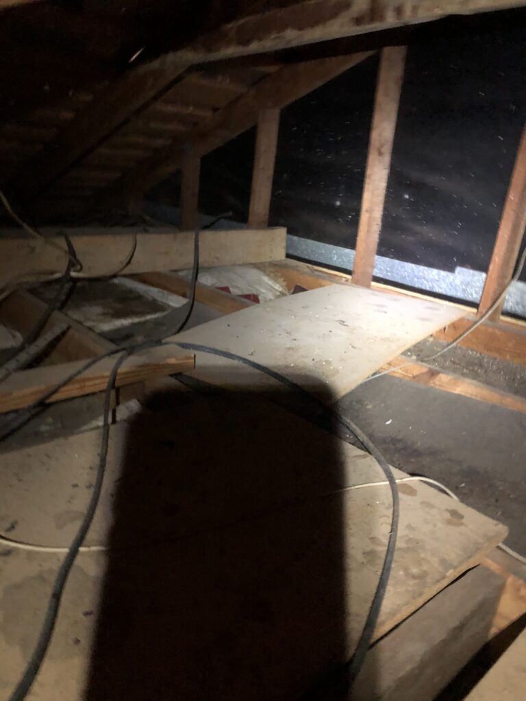 Existing attic insulation and surrounding framing